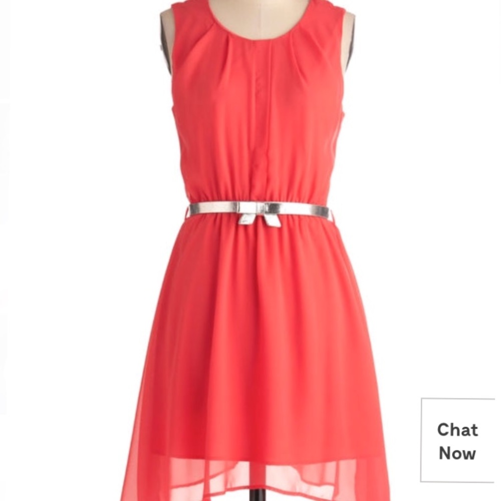 Coral backless dress with silver belt